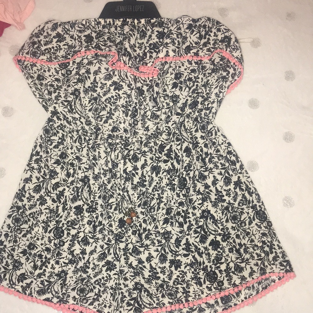 Floral off the shoulder romper.